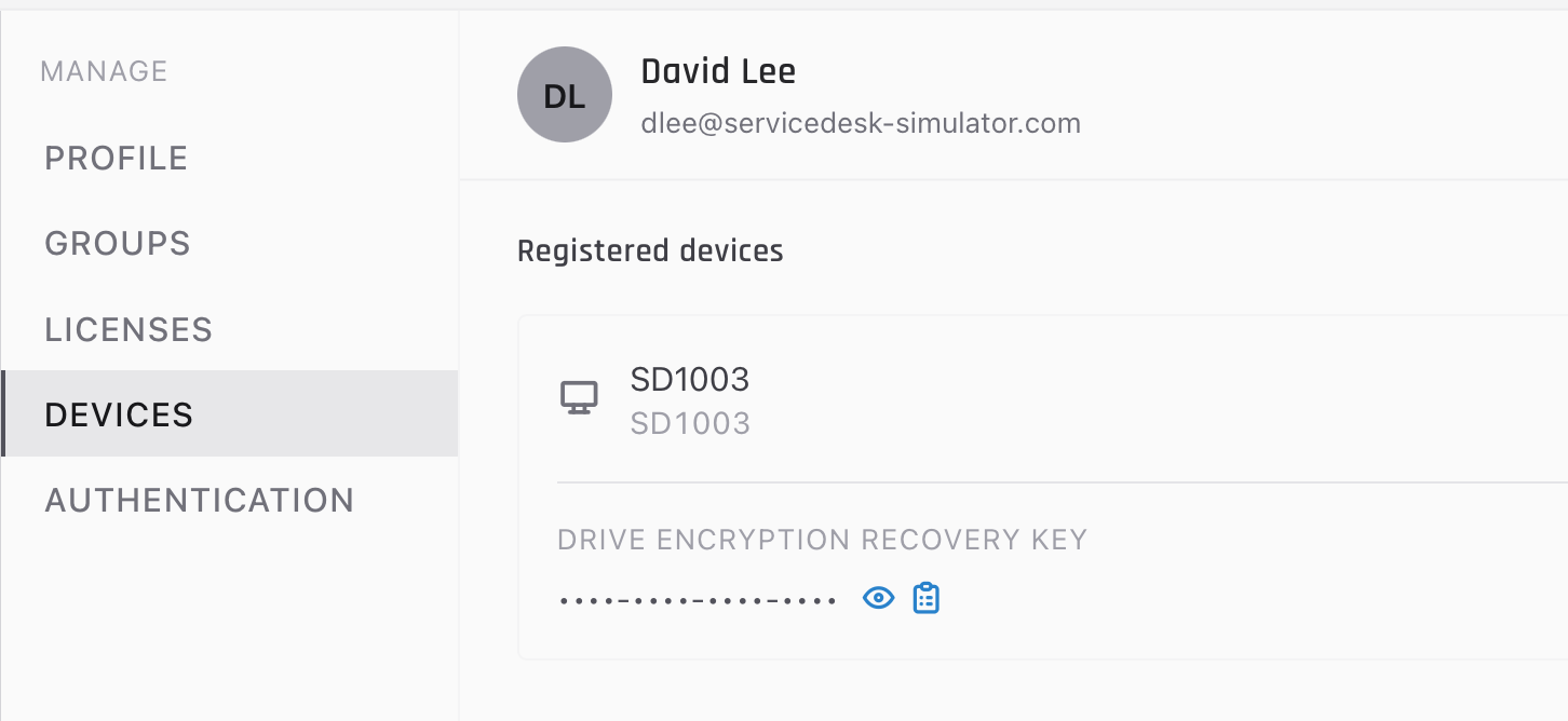 The Devices tab of a Directory record, showing one machine name with its asset tag beneath and a masked Drive Encryption Recovery Key with reveal and copy controls.